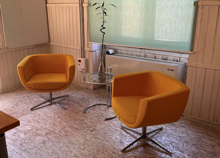 Cozy room with yellow chairs